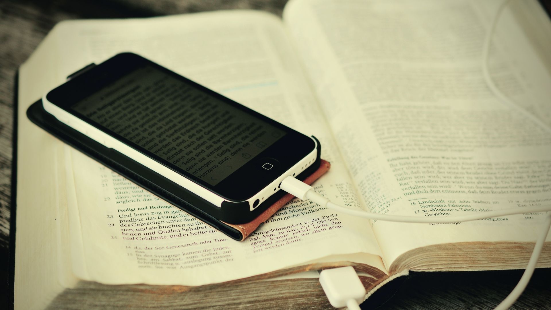 Bible with a mobile phone